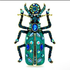 Beautiful Scarab brooch with rhinestones, New.